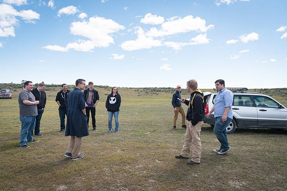 The Rocket Team from the Mechanical Engineering Department gather together to prepare for their rocket launch.