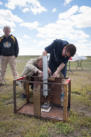 The Rocket Team from the Mechanical Engineering Department gather together to prepare for their rocket launch.