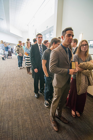 Students wait in line to shake hands with Elder Dallin H. Oaks, Quorum of the Twelve Apostles. Photo by Ryan Chase