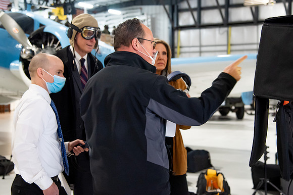 BYUI President and Sister Eyring film their devotional promotional video for Spring 2021 semester with the help of the University Relations team in the Legacy Flight Museum.