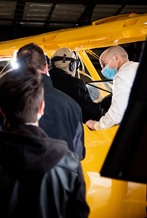 BYUI President and Sister Eyring film their devotional promotional video for Spring 2021 semester with the help of the University Relations team in the Legacy Flight Museum.