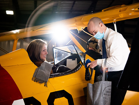 BYUI President and Sister Eyring film their devotional promotional video for Spring 2021 semester with the help of the University Relations team in the Legacy Flight Museum.
