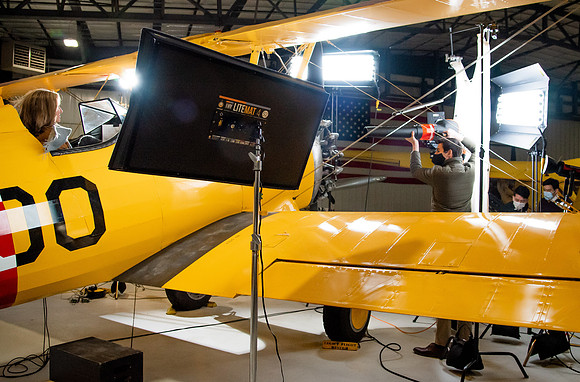 BYUI President and Sister Eyring film their devotional promotional video for Spring 2021 semester with the help of the University Relations team in the Legacy Flight Museum.