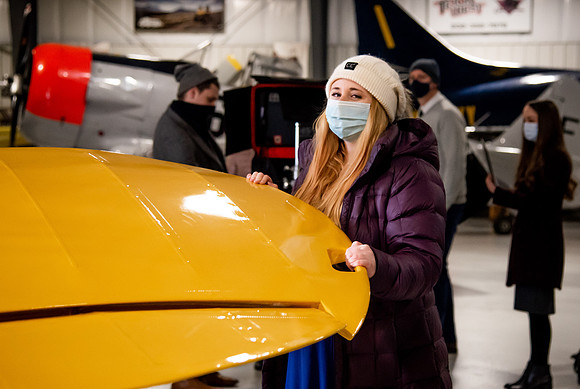BYUI President and Sister Eyring film their devotional promotional video for Spring 2021 semester with the help of the University Relations team in the Legacy Flight Museum.
