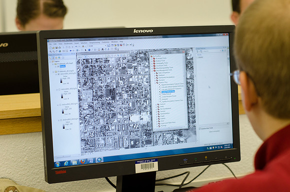 Sean Cannon teaches Geography 230 Intro to Geographic Info Systems.  In class today students were downloading a Google map zoomed into Rexburg then identifying streets in a new layer to create a local