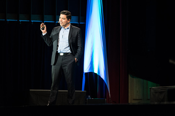 Carlos Carrasco, a product marketing manager for Microsoft, speaks at Power to Become. Spring 2017