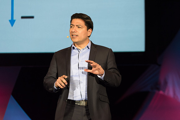Carlos Carrasco, a product marketing manager for Microsoft, speaks at Power to Become. Spring 2017