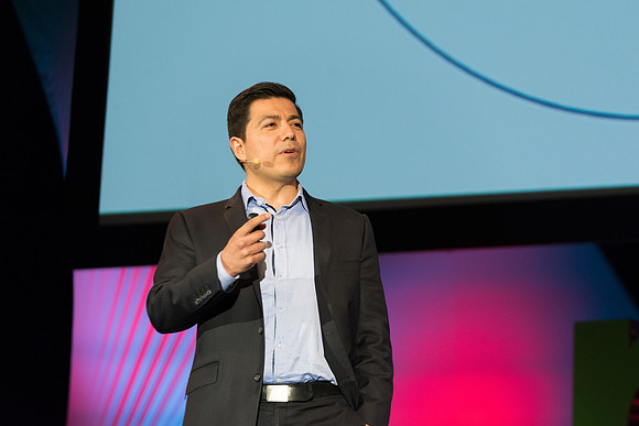 Carlos Carrasco, a product marketing manager for Microsoft, speaks at Power to Become. Spring 2017