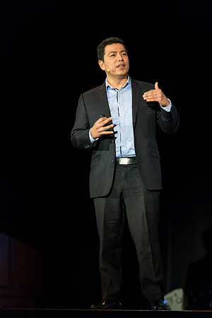 Carlos Carrasco, a product marketing manager for Microsoft, speaks at Power to Become. Spring 2017