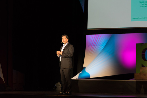 Carlos Carrasco, a product marketing manager for Microsoft, speaks at Power to Become. Spring 2017