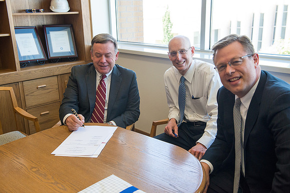 President Michael Crow of Arizona State University visits with President Eyring and Gilbert.