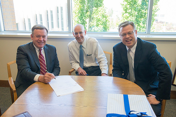 President Michael Crow of Arizona State University visits with President Eyring and Gilbert.