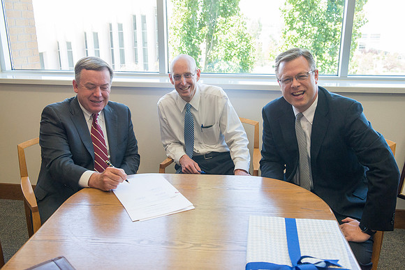President Michael Crow of Arizona State University visits with President Eyring and Gilbert.