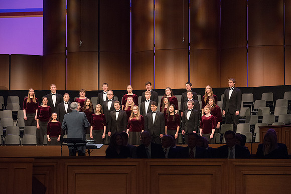 A choir performs at the start of devotional. 2017