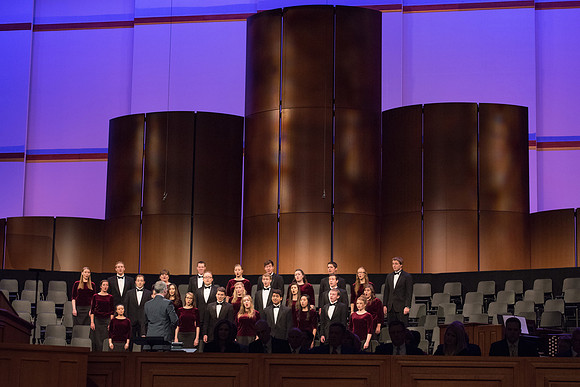 A choir performs at the start of devotional. 2017