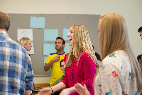 Sister Brooke McKenna teaches students in a communication class.