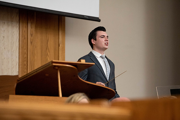 Daniel Balls, Lead Data Analyst at BYU-Idaho, addresses the students during summer session at the weekly Devotional.