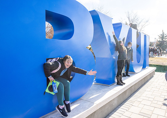 Unveiling of a new monument on campus: BYUI letters just below the Taylor Quad.