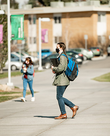 Students walk around BYUI campus on their first day of classes for the Spring 2021 semester.