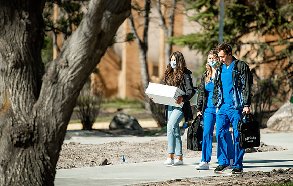 Students walk around BYUI campus on their first day of classes for the Spring 2021 semester.