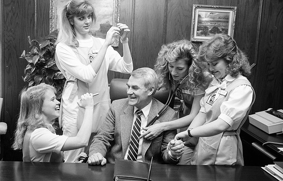 President Christensen doing a photoshoot with Nursing Students