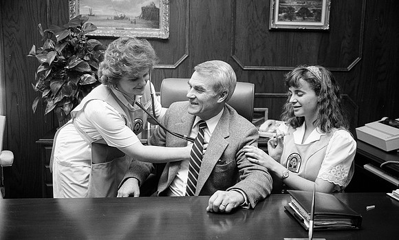 President Christensen doing a photoshoot with Nursing Students