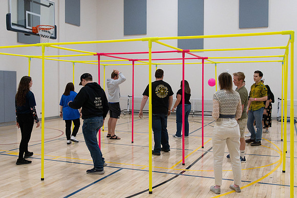 Students playing games and participating in activites on First Friday.