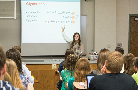 Sister Amanda Christensen talks to her Essentials of Human Nutrition class about Glycerides in the Clark Building during the 2014 Spring Semester.