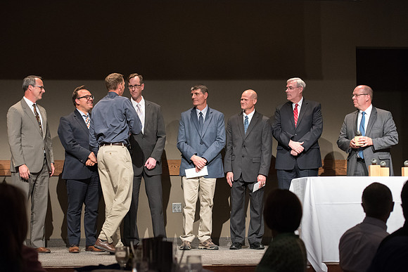 BYU-Idaho faculty are shown apprceiation at a banquet.