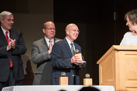 BYU-Idaho faculty are shown apprceiation at a banquet.