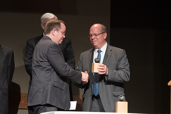 BYU-Idaho faculty are shown apprceiation at a banquet.