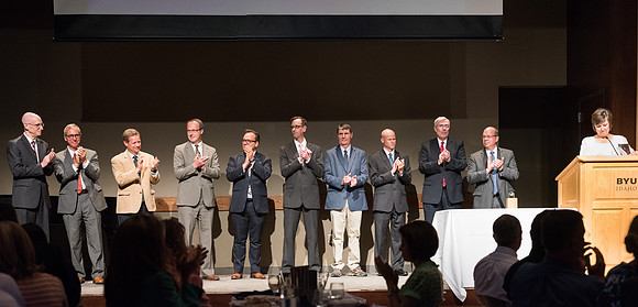 BYU-Idaho faculty are shown apprceiation at a banquet.