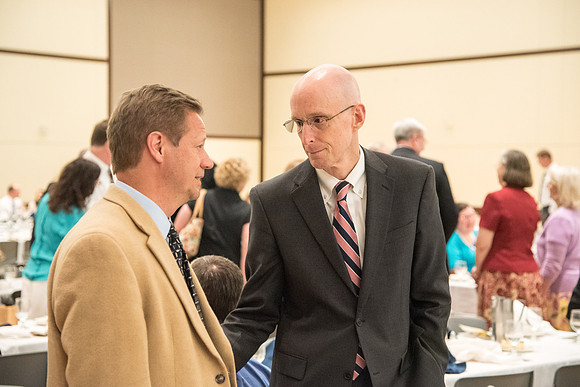 BYU-Idaho faculty are shown apprceiation at a banquet.