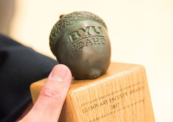 BYU-Idaho faculty are shown apprceiation at a banquet.