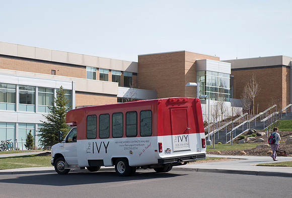 Beginning of Spring semester. The Ivy bus transports students to and from class.
