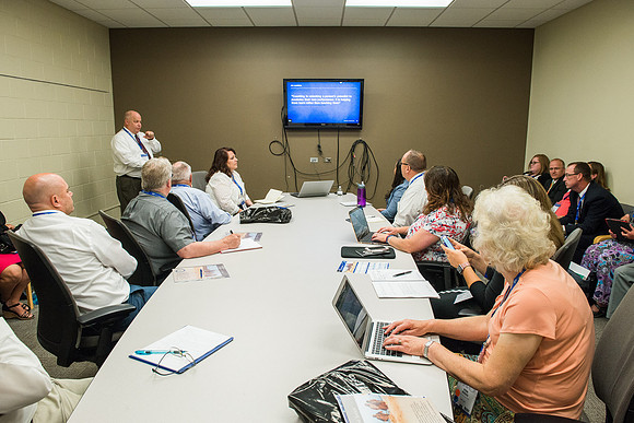 Online Instructors gather to learn at the Online Learning & Teaching Conference at BYU-Idaho. James Patterson leads a session on "Leaders and Coaches"2017