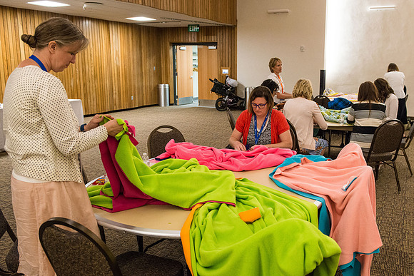 Online Instructors gather to learn at the Online Learning & Teaching Conference at BYU-Idaho. Participants have the opportunity do a little service, quilting. 2017