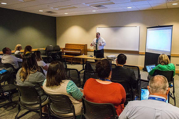 Online Instructors gather to learn at the Online Learning & Teaching Conference at BYU-Idaho. David Snider presents: "The Principal of Return and Report: Using Course Visits and Instructor Asessments