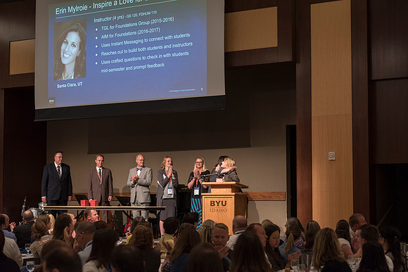 Online Employees gather together for a Banquet and Awards Ceremony for their final evening together.