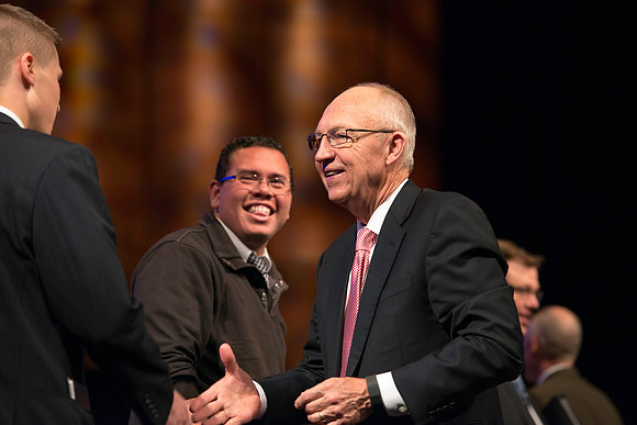 Emeritus General Authority of the Seventy greets students after the BYU-Idaho devotional.