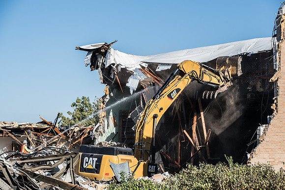 Big D Construction demolishing the Kirkham building during Summer break.