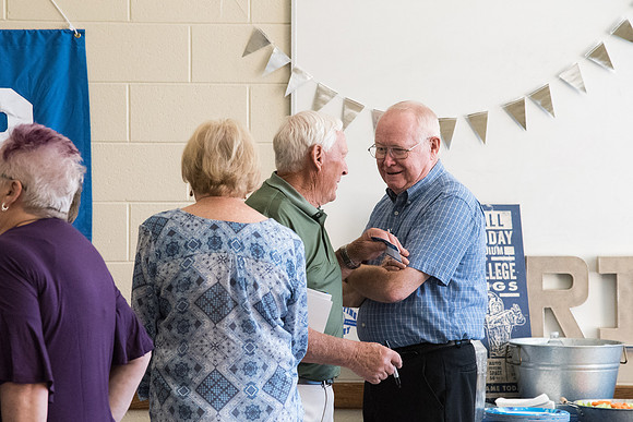 The Class of 1967 meets together in the Manwaring Center for a Reunion.