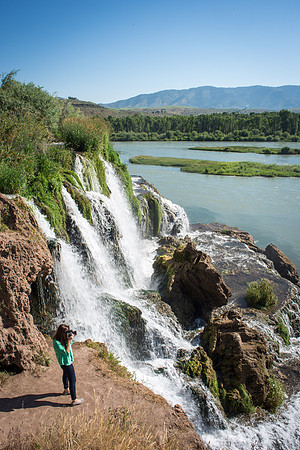 Emily Gottfredson, a photographer for University Relations, snaps some photos of the falls. 2017
