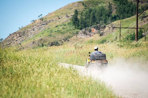 A man rides by on his four-wheeler in the Caribou National Forest. 2017
