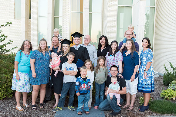 Graduates Scott and Melanie Wood visit with their families who flew from Maryland, Texas, Utah, and Washington state. Photo by Courtney Thomas.