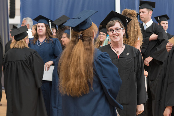 Pathway students gather together before their graduation.