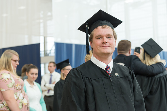 Pathway students gather together before their graduation.