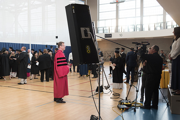 President Clark Gilbert stands with Pathway graduates.