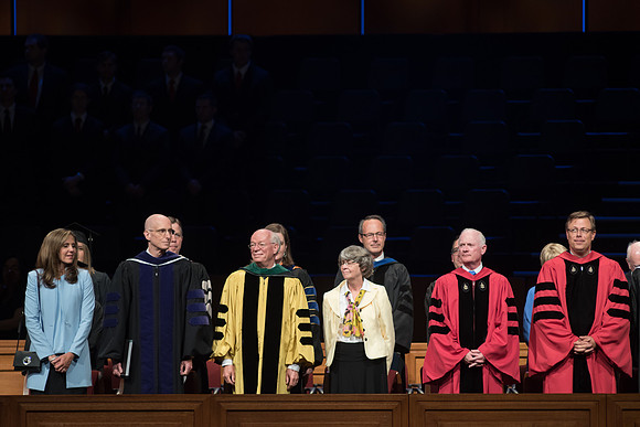 President and Sister Eyring, along with Elder and Sister Cornish, Elder Clark and President Gilbert, enter the I-Center auditorium before graduation. 2017