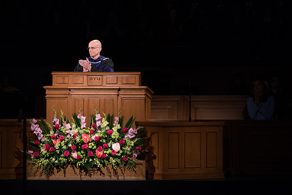 President Henry J. Eyring congratulates the new graduates. Photo by Garrett Blanchard.